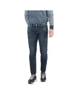 Jean 700/11 Jogg en coton indigo uni avec une coupe slim et des poches plaquées à l'arrière