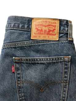 Jean 565 Loose Straight en coton bleu uni avec une coupe droite