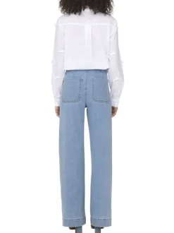 Jean Madeline en coton mélangé bleu uni avec une coupe flare