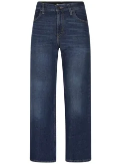Jean Middy Loose Boot en coton indigo avec une coupe droite
