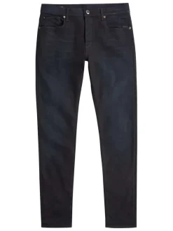 Jean noir avec une coupe slim à poches et des passants pour ceinture