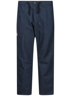 Jean otsu en coton indigo uni pourvu d'une coupe large et de multiples poches