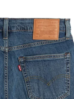 Jean 5 poches 511 en coton bleu délavé à coupe slim avec rivets cuivrés