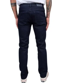 Jean 5 poches indigo en coton avec logo tricolore brodé et une coupe slim