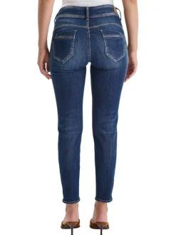 Jean Pulp High Regular en coton indigo uni avec une coupe ajustée et des surpiqûres oranges