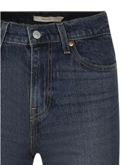 Jean slim en coton indigo uni avec une coupe slim et une taille intermédiaire