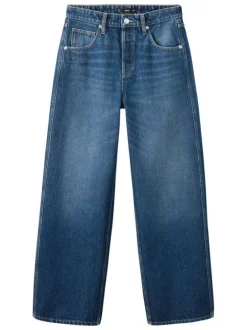 Jean taille haute en coton indigo délavé avec une coupe bootcut