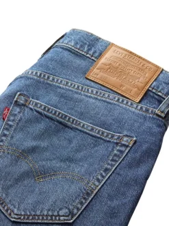 Jean 512® Taper bleu en coton à coupe slim avec un patch de la marque