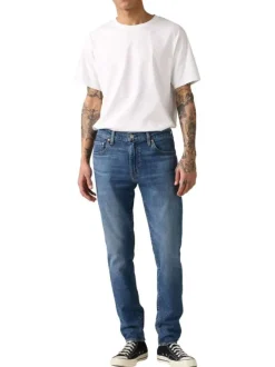 Jean 512® Taper bleu en coton à coupe slim avec un patch de la marque