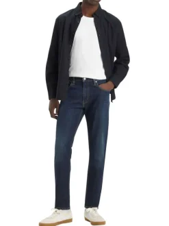 Jean 512® Taper indigo à coupe slim avec un patch de la marque