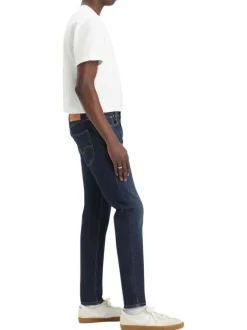 Jean 512® Taper indigo à coupe slim avec un patch de la marque