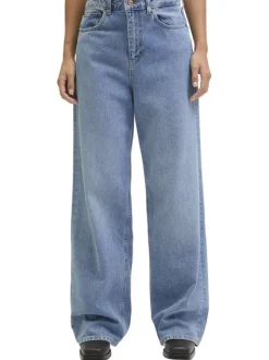 Jean Tokyo en coton bleu pourvu d'une coupe ample et du patch de la marque