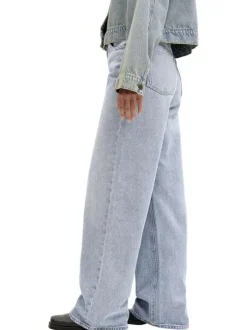 Jean Tokyo en coton bleu pourvu d'une fermeture zippée et boutonnée