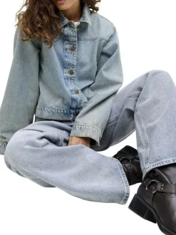 Jean Tokyo en coton bleu pourvu d'une fermeture zippée et boutonnée
