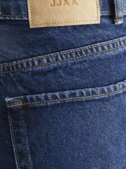 Jean Tokyo en coton indigo uni avec une coupe bootcut et patch de la marque