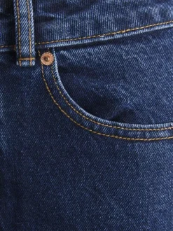Jean Tokyo en coton indigo uni avec une coupe bootcut et patch de la marque