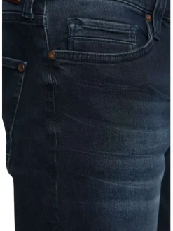 Jean Vegas en coton indigo slim avec patch de la marque à l'arrière