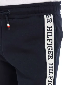Jogging en coton mélangé marine uni avec une coupe droite et un lien de serrage