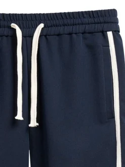 Jogging Katie marine uni avec une coupe droite et une taille élastiquée