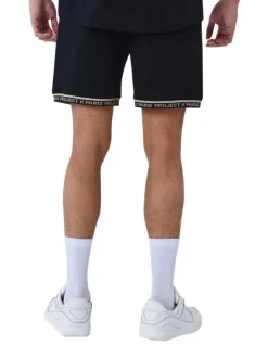 Jogging noir uni avec nom de la marque brodé et une coupe droite
