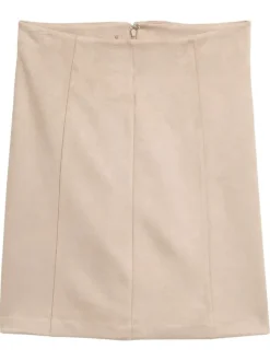 Jupe courte beige unie en daim avec fermeture à glissière à l'arrière