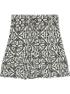 Jupe courte écrue à motifs avec un lien à nouer et une taille élastiquée