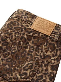 Jupe courte en coton avec un imprimé fantaisie léopard et patch de la marque