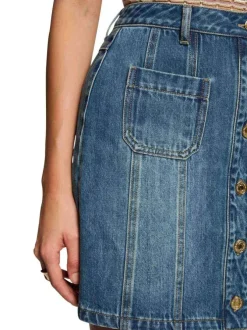 Jupe courte en coton stone denim unie pourvue d'une coupe trapèze