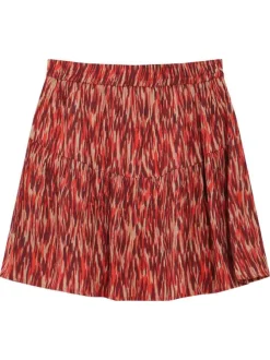 Jupe courte rouge avec motifs abstraits et une coupe fluide