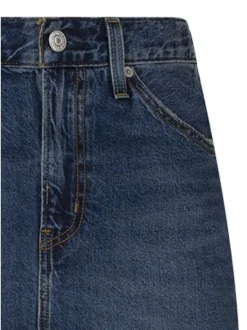 Jupe longue en coton indigo uni avec une coupe droite et une fente arrière