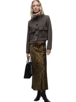 Jupe longue marron imprimée à motif crocodile avec une coupe évasée