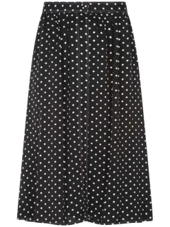 Jupe longue noire à pois avec une coupe droite fluide et une fermeture boutonnée