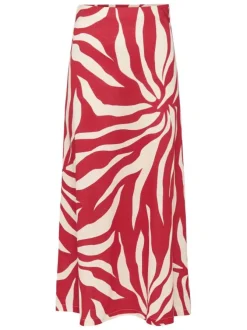 Jupe longue rouge avec des motifs floraux et une coupe fluide