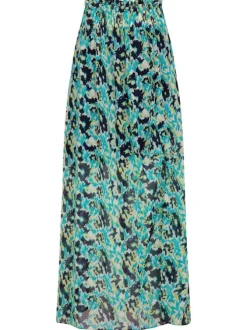 Jupe longue turquoise imprimée mouchetée avec une coupe droite fluide