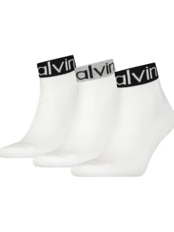 Lot de 3 paires de chaussettes hautes blanches avec inscription Calvin Klein pour homme