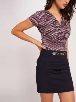 Mini-jupe marine pour femme unie avec boucle dorée