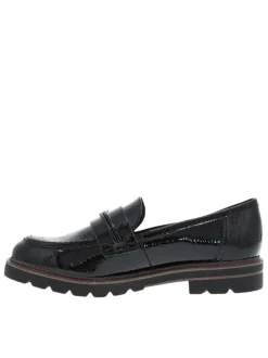 Mocassins noirs vernis à semelle plate avec un bijou à l'avant