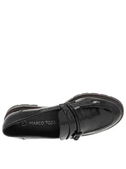 Mocassins noirs vernis à semelle plate avec un bijou à l'avant
