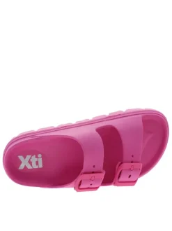 Mules fuchsia à talon plat avec des boucles à ardillon ton sur ton