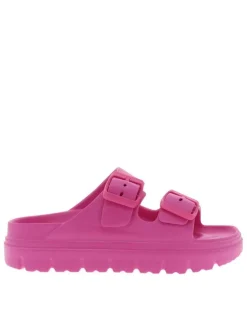 Mules fuchsia à talon plat avec des boucles à ardillon ton sur ton