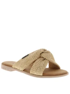 Mules beiges à semelle plate avec des brides croisées à l'avant