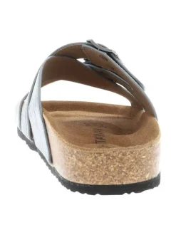 Mules bleues à semelle compensée bas et une fermeture à boucle à ardillon