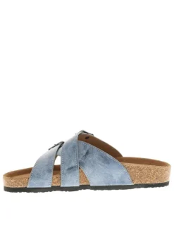 Mules bleues à semelle compensée bas et une fermeture à boucle à ardillon