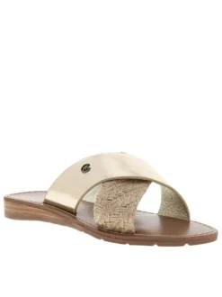 Mules Brana dorées avec un talon compensé bas et brides entrecroisées