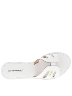 Mules Damia en cuir blanches avec logo métallique et un talon plat