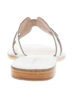 Mules Damia en cuir blanches avec logo métallique et un talon plat