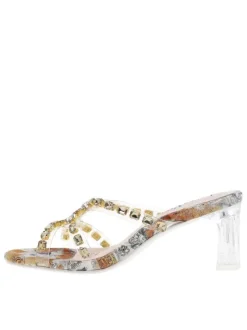 Mules dorées à talon décroché haut avec semelle imprimée à motif floral
