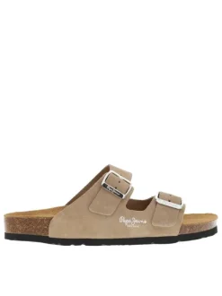 Mules en cuir beiges en suède avec deux boucles à ardillon et à semelle plate