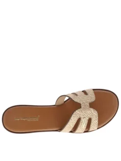Mules en cuir beiges à semelle plate avec un effet zébré doré à l'avant