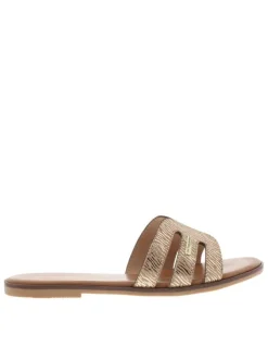 Mules en cuir beiges à semelle plate avec un effet zébré doré à l'avant